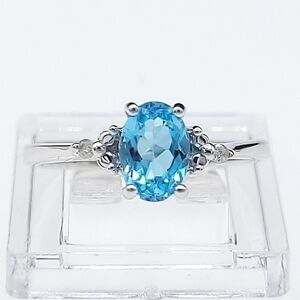 10k white gold blue topaz and diamond ring